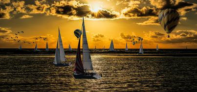 sailing boats and hot air balloon