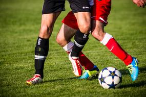 Football Clip Boots in the game on the field