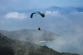 Extreme Sport, paraglider at Sky over scenic coast