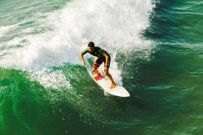 surfing man on wave