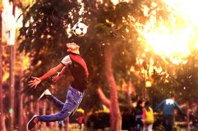 jumping football player