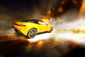 Beautiful, shiny, yellow car on the race, among the lights