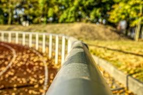 railings along the racetrack close-up on blurred background