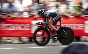 athlete on a racing bike on the track