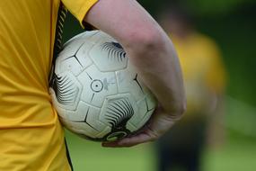 Football Ball in hand