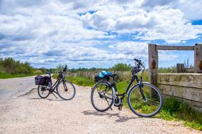 two bicycles near a rural road