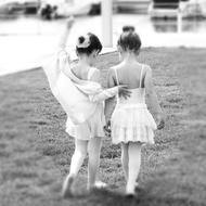 black and white, two young ballerinas on the shore of the reservoir