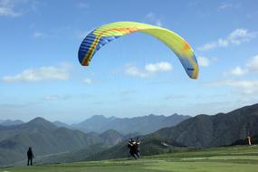 paragliding people in mountains, danyang