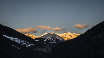 snow in the mountains of south tyrol at dusk