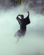 dancing man in fog