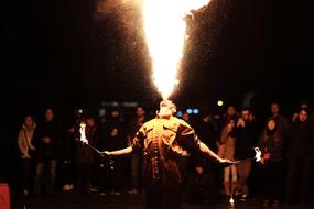 crowd around the fire show