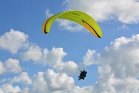 man on a paraglider over the French Riviera