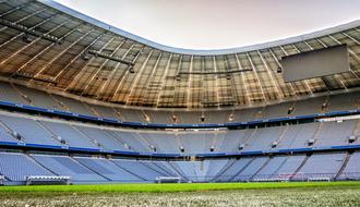 Beautiful, round Allianz Arena of Bayern Munich, with green grass, in Bavaria, Germany