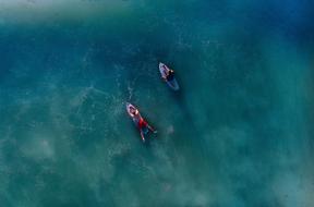 two men surfing