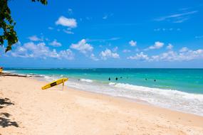 surfer on idyll seacoast, thailand, phuket patong beach