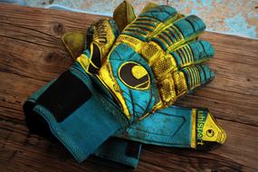 Bright goalkeeper's dirty gloves