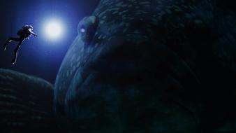 scuba diver met giant fish underwater