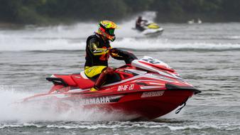 athletes compete on jet skis