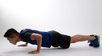 Fitness Exercising boy on white background