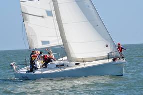 Sailboat with people on Water