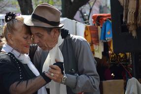 tango of cute old men in buenos aires