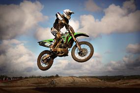 high jump in motocross on a cloudy day