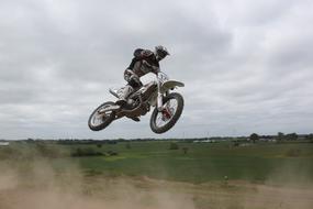 biker jump in motocross competition