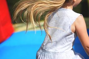 winding blonde hairs of Little Girl