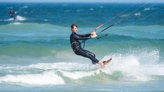 Kite Boarder, young man on wave