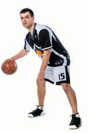 photo of a basketball player in black and white uniform with a ball on a white background