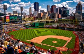 People, on the colorful Pnc Park, among the colorful buildings, in Pittsburgh, Pennsylvania, USA