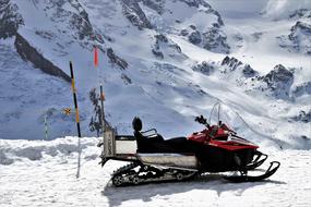 snowmobile in the mountains on a sunny day