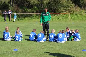 Football Coach and Team