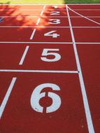 numbers on the tracks in the stadium