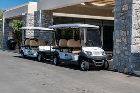 parked golf carts at the building