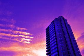 high rise building at sunset