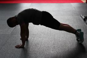 a man does push-UPS