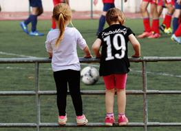 girl fence football