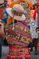 back view of girl in traditional Bolivian costume