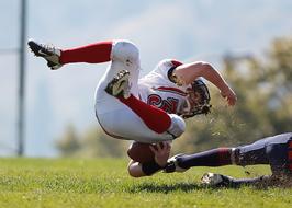 Falling man on the American Football competition on the field