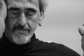 old oriental man face with closed eyes