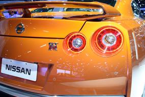 Rear view of new yellow nissan car