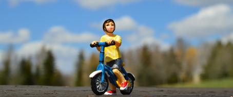 Boy Bicycle clay figurine