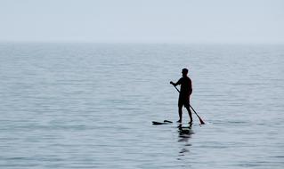 water sports with paddle and board