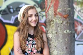 Young Teenager girl and wall graffiti