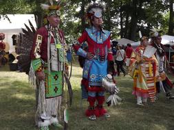 people in Indian costumes at a festival in Canada