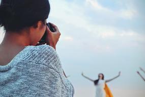 the girl takes pictures of the ballerina