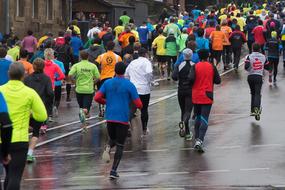 sports running on a city street