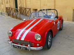 Red Sports Car on a historic street