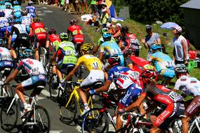 Riders in colorful uniform, on the bicycles, on the Tour De France